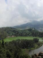 Mountain landscape, lake and mountain range photo