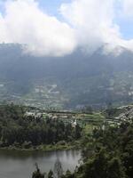 Mountain landscape, lake and mountain range photo