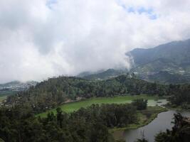 Mountain landscape, lake and mountain range photo