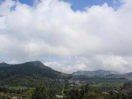 Mountain landscape, lake and mountain range photo