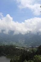 Mountain landscape, lake and mountain range photo