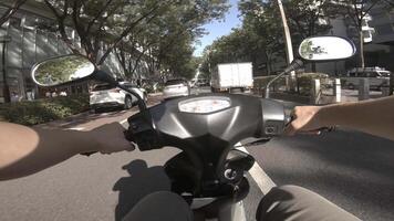 A point of view of driving by bike at Omotesando street in Tokyo video