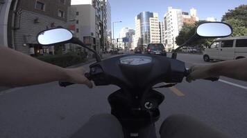 A point of view of driving by bike at Aoyama avenue in Tokyo video