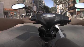 A point of view of driving by bike at Aoyama avenue in Tokyo video