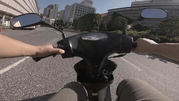 A point of view of driving by bike at the business street in Shinjuku video