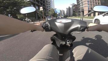 A point of view of driving by bike at Aoyama avenue in Tokyo video