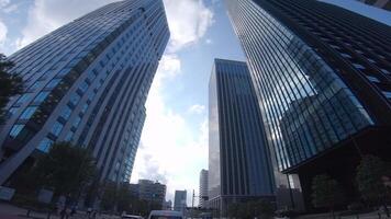 A moving cityscape at the urban city in Shinjuku by low angle video