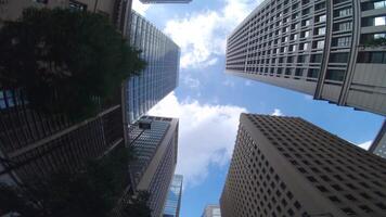 A moving cityscape of the buildings at the businesstown in Otemachi Tokyo low angle video