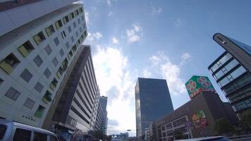 A moving cityscape at the urban city in Shinjuku by low angle video