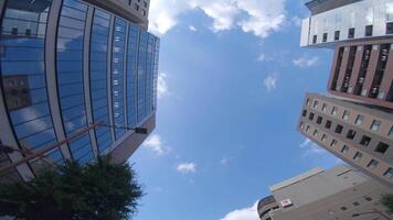 A moving cityscape of the buildings at the businesstown in Otemachi Tokyo low angle video