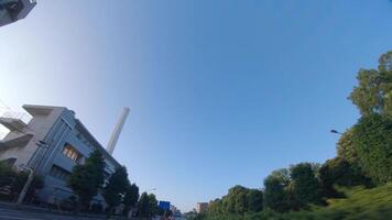 A moving cityscape at the downtown at Kanpachi avenue in Tokyo by low angle video