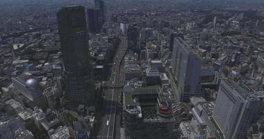 un lapso de tiempo de panorámico autopista a shibuya zona en tokio alto ángulo video