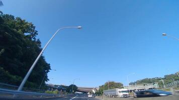 A POV shot of highway at in Japan by low angle video