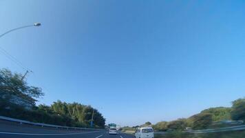 A POV shot of highway at in Japan by low angle video