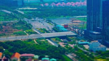 un lapso de tiempo de miniatura tráfico mermelada a el ocupado pueblo en Ho chi minh alto ángulo video