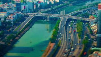 A timelapse of miniature traffic jam at the busy town in Ho Chi Minh high angle panning video