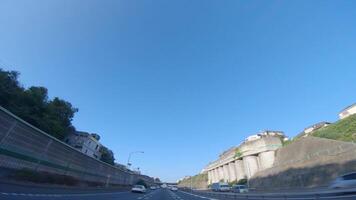 A POV shot of highway at in Japan by low angle video
