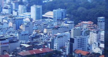 A high angle view of miniature cityscape at the downtown in Ho Chi Minh daytime tiltshift video