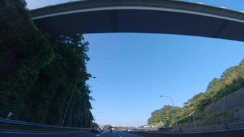 A POV shot of highway at in Japan by low angle video