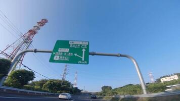 A POV shot of highway at in Japan by low angle video