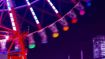 uma espaço de tempo do ferris roda às a diversão parque dentro Tóquio às noite video
