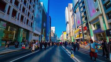 A timelapse of the city street at the downtown in Ginza Tokyo daytime wide shot zoom video