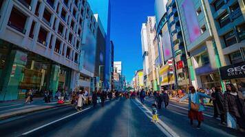 A timelapse of the city street at the downtown in Ginza Tokyo daytime wide shot tilt video