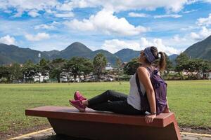 Traveler relaxes with the fascinating landscape of the Peruvian jungle. photo