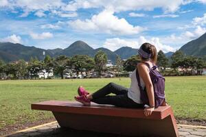 Traveler relaxes with the fascinating landscape of the Peruvian jungle. photo