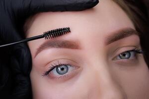 Macro photo of eyebrows after permanent eyebrow makeup. PMU Procedure, Permanent Eyebrow Makeup.