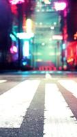 A city street with a crosswalk at night video