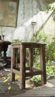 An abandoned room with a wooden chair on a worn wooden floor video