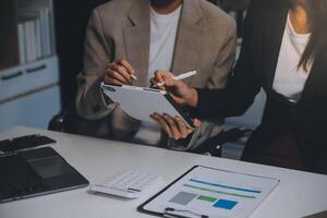 Team of business people working together in the meeting room office, teamwork background charts and graphs banner, double exposure successful teamwork,business planning concept. photo