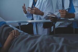 Doctor and patient discussing something while sitting at the table . Medicine and health care concept. Doctor and patient photo