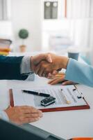 Insurance officers hand over the car keys after the tenant. have signed an auto insurance document or a lease or agreement document Buying or selling a new or used car with a car photo