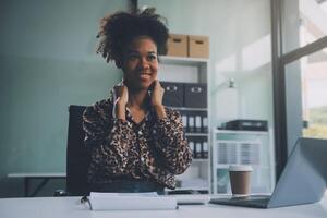 Asian women Aches from working She felt like relaxing photo