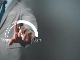 Businessman pointing to the target. Business concept. management concept business planning concept photo