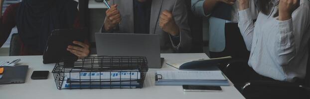 Team of business people working together in the meeting room office, teamwork background charts and graphs banner, double exposure successful teamwork,business planning concept. photo