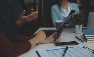 Team of business people working together in the meeting room office, teamwork background charts and graphs banner, double exposure successful teamwork,business planning concept. photo