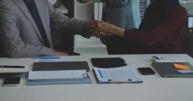 Business people shaking hands after meeting. colleagues handshaking after conference. Greeting deal, teamwork partnership cooperate concept. photo