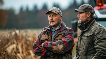 Agronomists Discussing Over New Farm Truck in Autumn Field photo