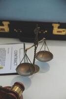 American woman lawyer or businesswoman African working with laptop, searching, analyzing data, reading contract documents work with law books hammer of justice Consulting lawyer concept. photo