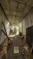 A dilapidated hallway filled with scattered debris and abandoned items video