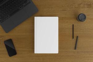 Book Cover and Phone on Wooden Table photo