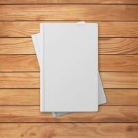 Two book covers on wooden surface photo