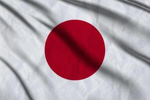 cerca arriba ondulación bandera de Japón. foto