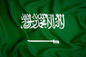 Saudi Arabia flag background. 3D wave illustration effect. photo