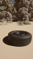 uma pneu sentado dentro a meio do uma deserto video