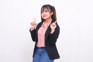 Beautiful happy Asian office woman in her 20s thin smile wearing suit shirt working professional both hands pointing up on white background studio portrait for banner ad, banner, billboard photo