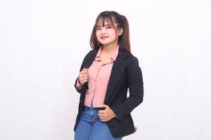Beautiful Asian businesswoman in suit standing confidently cheerful on white background studio portrait for advertising materials, banners, billboards, job vacancies, business opportunities photo